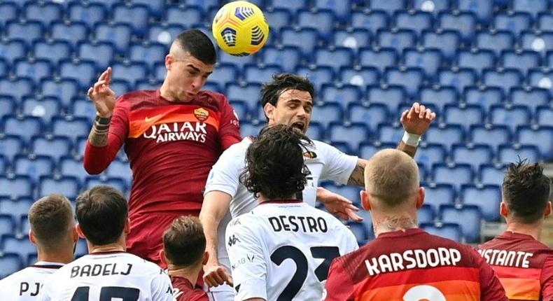 Roma defender Gianluca Mancini rose highest and nodded his fourth league goal this season against Genoa.