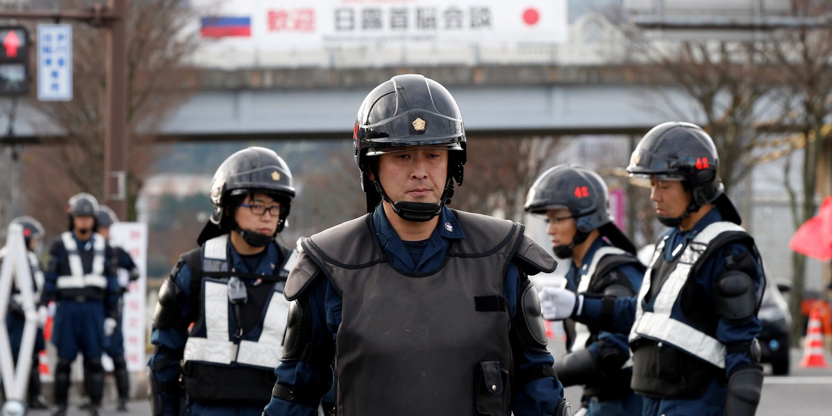 Even Japanese riot police infrequently turn to guns, instead preferring long batons.