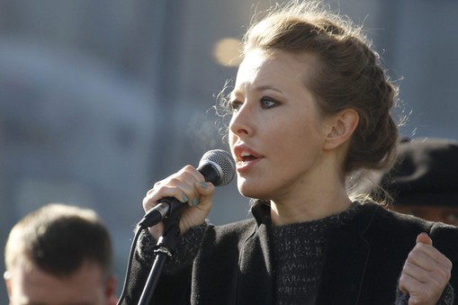 Television host and opposition activist Sobchak delivers a speech during a demonstration for fair el