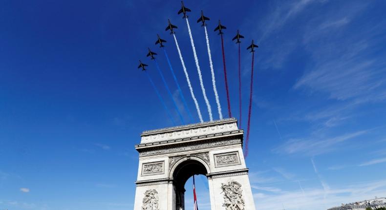 The French air force will still carry out its traditional flyover of the Arc de Triomphe and the Champs-Elysees