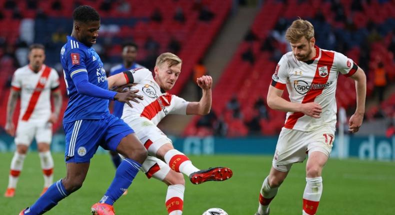 Nigerian Kelechi Iheanacho (L) of Leicester City takes on two Southampton players.