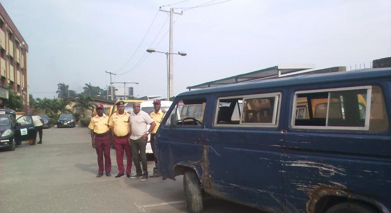 Third from Left, Mr Olajide Oduyoye, General Manager, Lagos State Traffic Management Authority (LASTMA) backing commercial buses arrested on Wednesday for v One Way driving “. (11/12/19) (NAN)