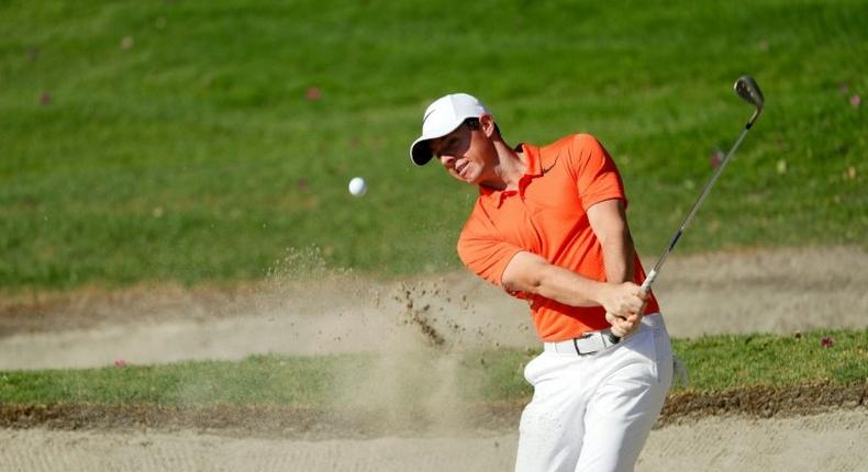 Rory McIlroy of Northern Ireland blasts from a bunker during practie for the World Golf Championships Mexico Championship at Club De Golf Chapultepec on March 1, 2017