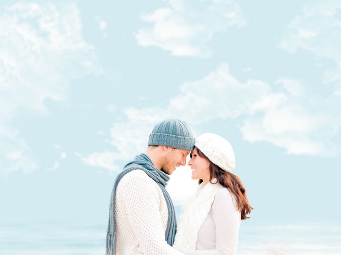 12627_stock-photo-happy-pair-of-male-and-female-embracing-and-having-fun-wearing-warm-clothes-outside-on-coast-behind-shutterstock_62844538