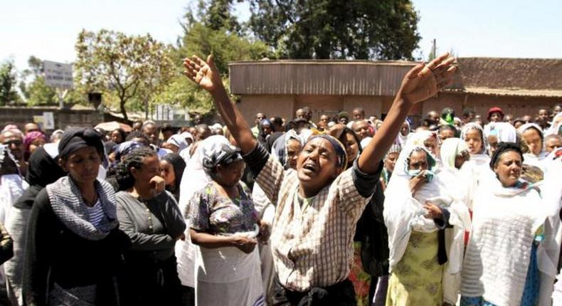 A woman cries at a gathering of the 30 Ethiopian victims killed by members of the militant Islamic State in Libya in the capital Addis Ababa April 21 2015.