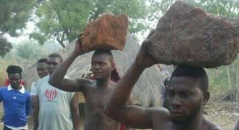Instant justice: Thieves paraded with rocks on their heads as residents whip them