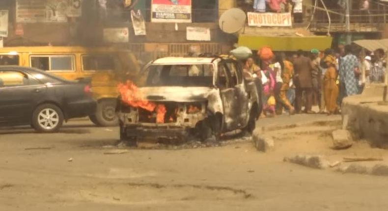 Protesting bike riders set a Lagos govt van on fire on Wednesday, February 5, 2020 (Pulse)