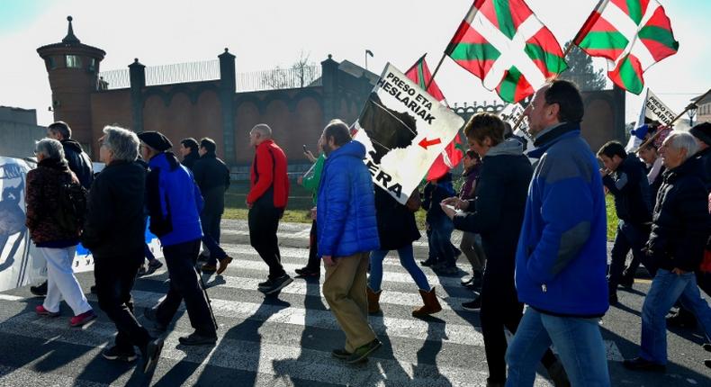 People holding Basque flags demonstrated in December outside Basauri jail near Bilbao for the release of ETA-linked prisoners -- but some relatives of the group's victims strongly oppose detainees being brought closer to home