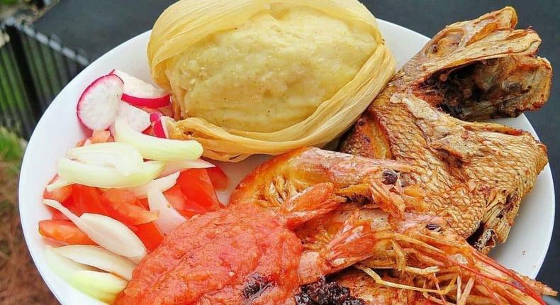 Ga kenkey served with pepper and fish