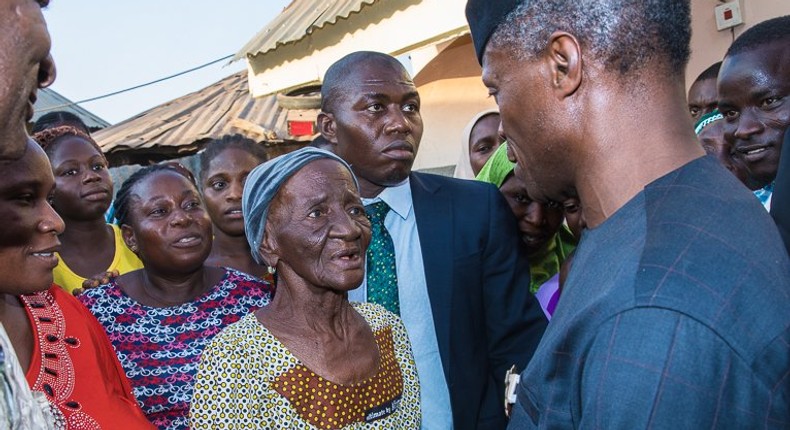 Vice President, Professor Yemi Osinbajo at a door-to-door campaign in Abuja