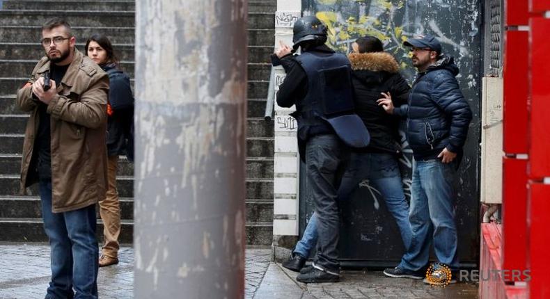 Paris police shoot dead knife-wielding man on Charlie Hebdo anniversary