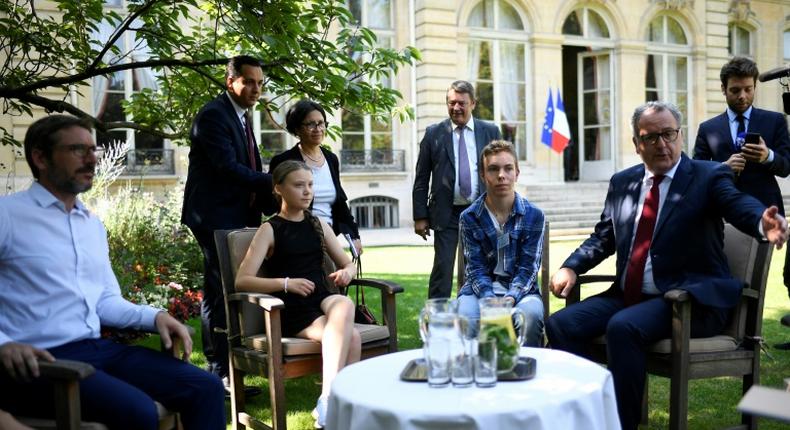 Thunberg (2nd L) was received by President of the French National Assembly Richard Ferrand (R) in the garden of the Hotel de Lassay ahead of her visit of the French National Assembly