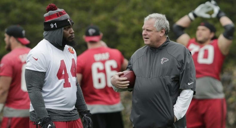 Vic Beasley of the Atlanta Falcons talks with Defensive Coordinator Richard Smith during the Super Bowl LI practice on February 3, 2017 in Houston, Texas