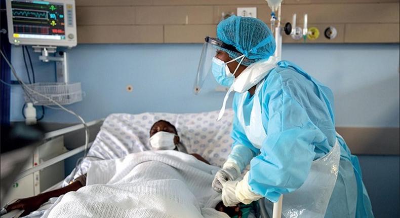 A health personnel attends to a Covid-19-patient