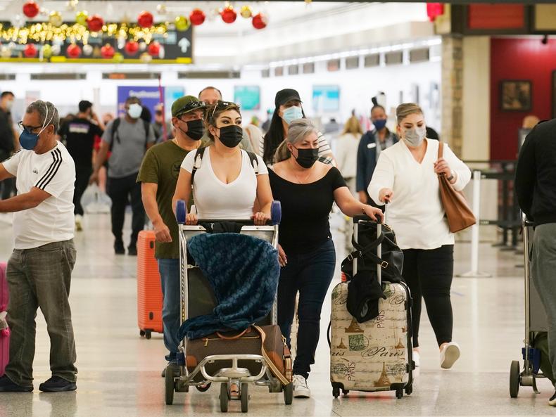 Travelers in Miami International Airport in 2021.