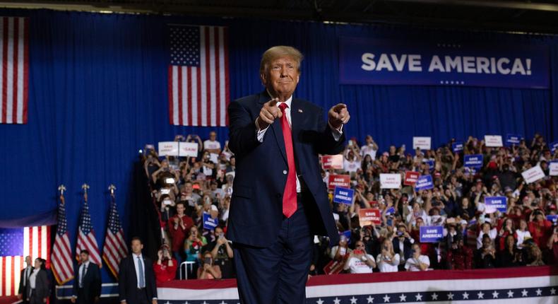 Former U.S. President Donald Trump waves to the crowd during a Save America rally on October 1, 2022 in Warren, Michigan.