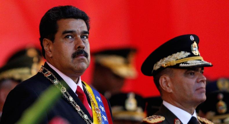 Venezuelan President Nicolas Maduro at a military parade to celebrate the 195th anniversary of the Battle of Carabobo, next to Venezuelan Defense Minister Vladimir Padrino Lopez, in Caracas, June 24, 2016.