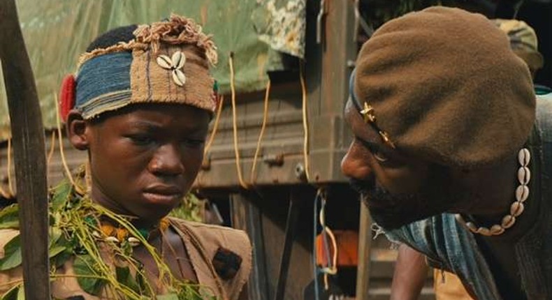 Abraham Attah and Idris Elba in Beasts of no Nations