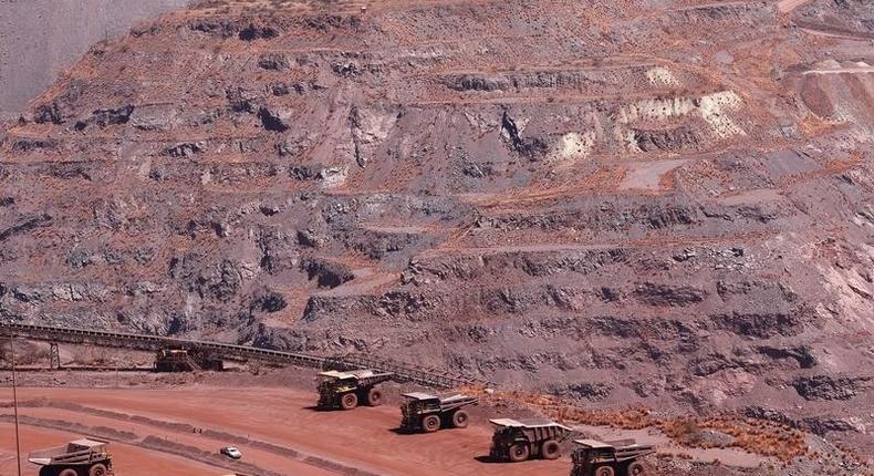 Haul trucks are seen at Kumba Iron Ore, the world's largest iron ore mines in Khathu, Northern Cape Province in a file photo. REUTERS/Siphiwe Sibeko