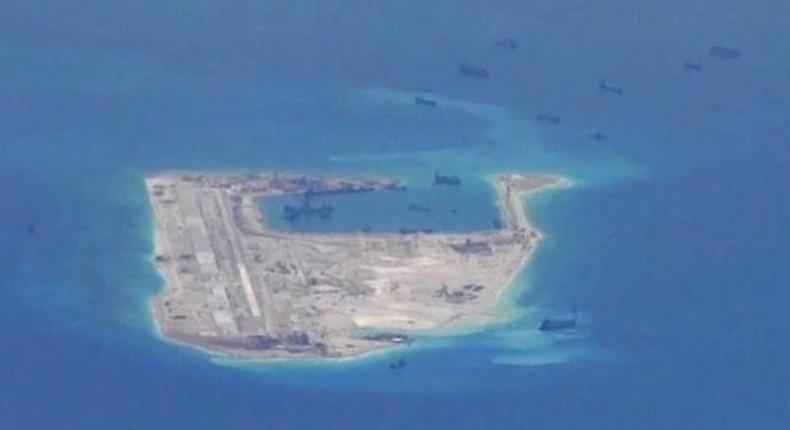 Chinese military aircraft makes first public landing on disputed island