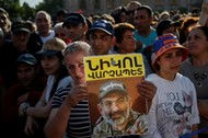 Armenian opposition supporters attend a rally after protest movement leader Nikol Pashinyan announce