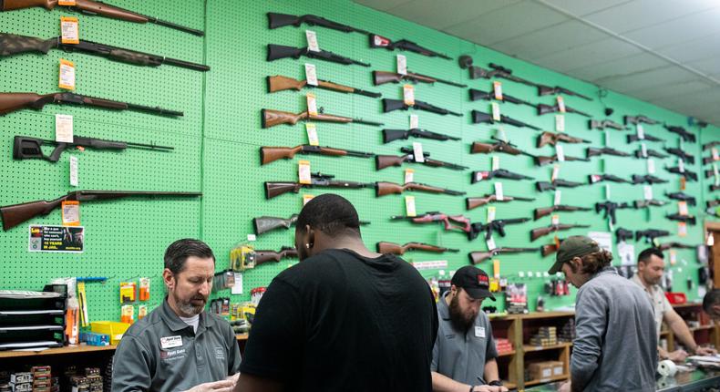 Are Guns 'Essential' in the Virus Era? Americans Stock Up as States Differ