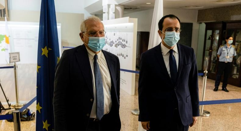 EU foreign policy chief Josep Borrell (L) meets with Cyprus' Foreign Minister Nikos Christodoulides at the foreign ministry headquarters in the capital Nicosia on June 25, 2020