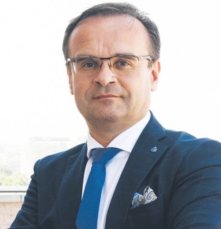 Dariusz Szwed z PKO BP: Trzeba z uwagą słuchać głosów polityków [WYWIAD]