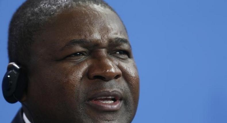 Mozambique President Filipe Nyusi speaks to media during a news conference with German Chancellor Angela Merkel (unseen) after their meeting at the Chancellery in Berlin, Germany, April 19, 2016. 