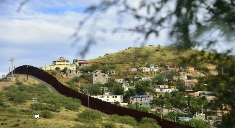 Residents of Nogales on the US-Mexico border point to their town, already divded in two by an 18-foot border wall, as an example of why Trump's wall ambitions won't work