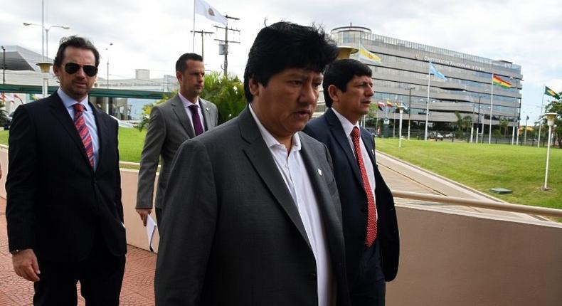 Peru's Football Federation chief Edwin Oviedo (C), pictured in 2015, was detained in an early morning raid on his home in Lima