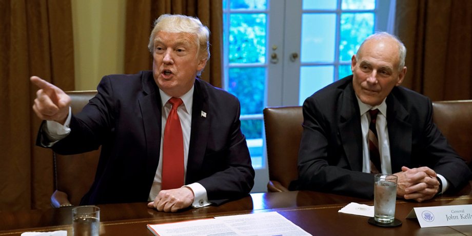 FILE PHOTO - U.S. President Donald Trump gestures next to White House Chief of Staff John Kelly during a briefing with senior military leaders at the White House in Washington, U.S.