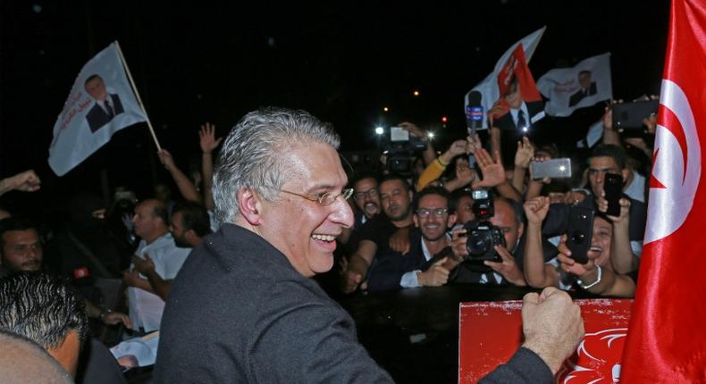 Tunisia's presidential candidate Nabil Karoui is greeted by his supporters after being released from Mornaguia prison near the capital Tunis ahead of Sunday's runoff