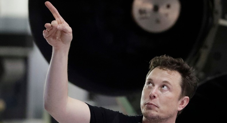 elon musk pointing up spacex bfr big falcon rocket moon mission lunar event AP_18261099411389