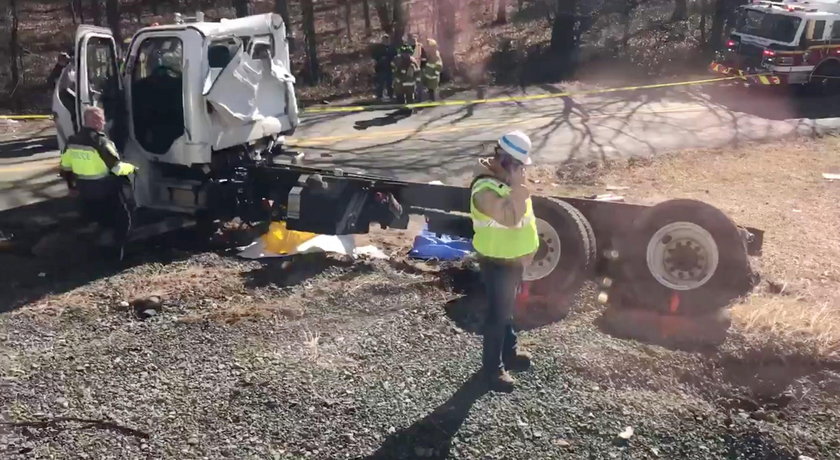 View of the scene following the accident when a train traveling from Washington to West Virginia car