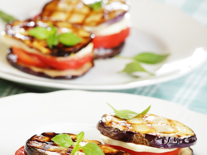 10167_stock-photo-aubergine-towers-with-mozzarella-and-tomato-shutterstock_36873871