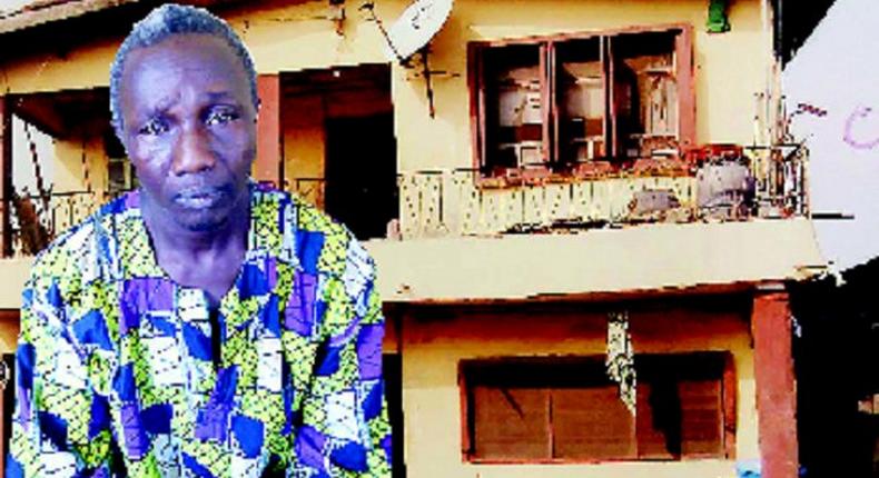 Raphael Agboola and the house where the incident happened