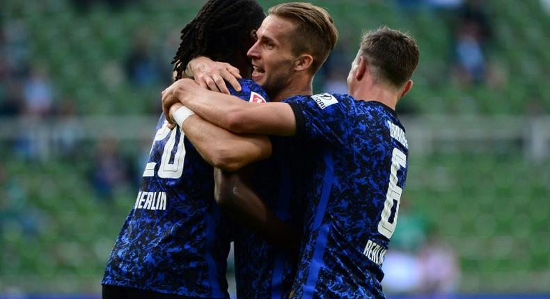 Hertha Berlin celebrate after defender Peter Pekarik (C) scores their opening goal at Werder Bremen