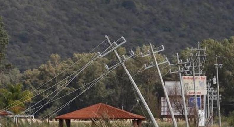 Electricity poles impacted by wind after the passing of Hurricane Patricia are seen in La Union de Tula, Mexico October 24, 2015.