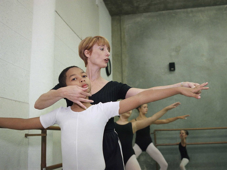 Noticing her potential, her coach pointed her toward ballet classes as the local Boys & Girls Club. "I wasn’t excited by the idea of being with people I didn’t know, and though I loved movement, I had no particular feelings about ballet," Copeland told the New Yorker. Here's her teacher, Cindy Bradley, working with a fellow student. 