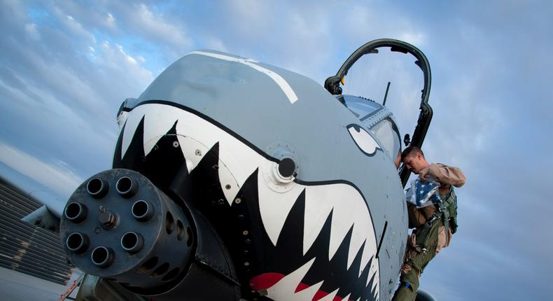 Capt. Richard Olson, 74th Expeditionary Fighter Squadron A-10 pilot, gets off an A-10 Warthog after his flight at Kandahar Airfield, Afghanistan, Sept. 2, 2011.