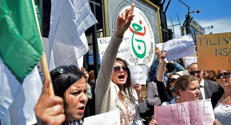 Demonstrators gather during a protest by state TV employees against censorship in the capital Algiers