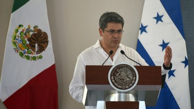 Juan Orlando Hernandez served two terms as Honduran president [AFP]