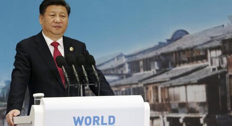 President Xi says China will guarantee foreign companies' legal rights