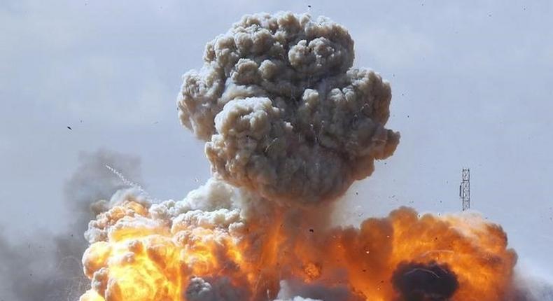 Vehicles belonging to forces loyal to Libyan leader Muammar Gaddafi explode after an air strike by coalition forces, along a road between Benghazi and Ajdabiyah March 20, 2011. 