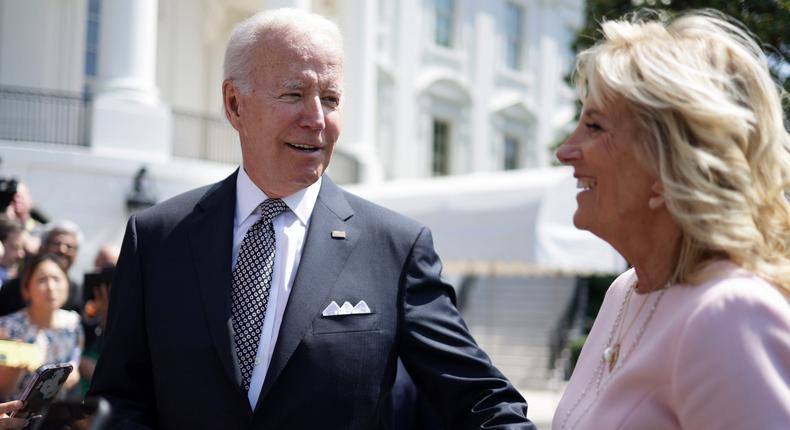 President Joe Biden and first lady Jill Biden hold hands outside of the White House earlier this month.