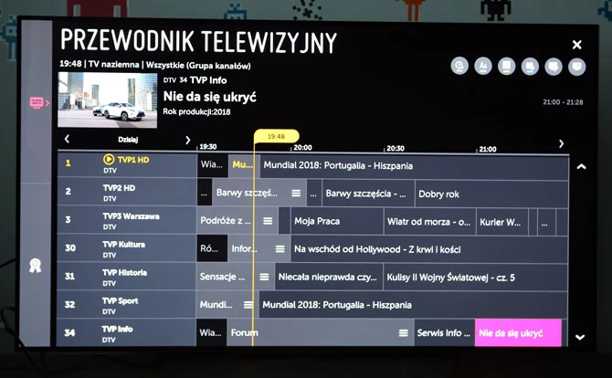 Wbudowany przewodnik po programach w telewizorze LG OLED55B8PLA - funkcjonalne rozwiązanie, ale nie bardzo współpracuje ze "sztuczną inteligencją".