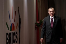 Turkey's President Tayyip Erdogan arrives for a group picture at the BRICS summit meeting in Johannesburg