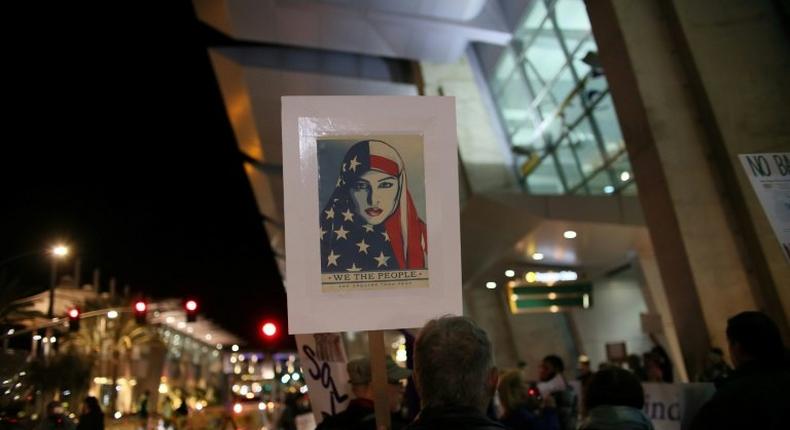 Protesters chant during a rally against the travel ban at San Diego International Airport on March 6, 2017 in San Diego, California