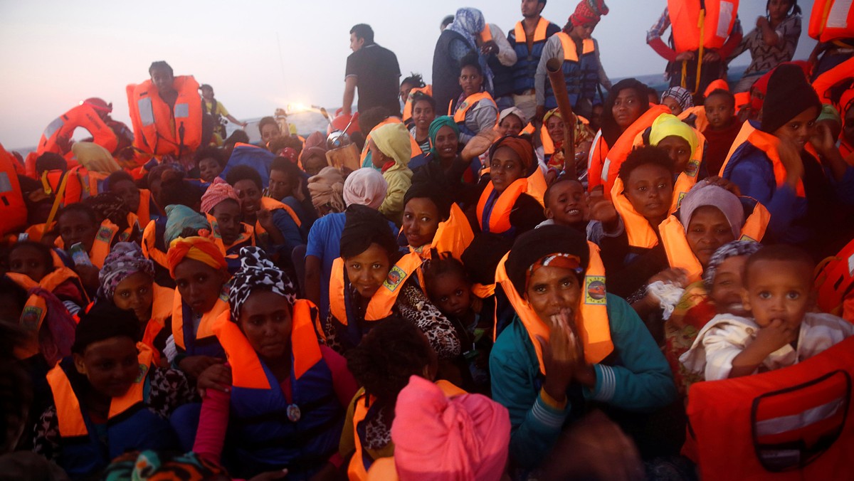 Migrants from Eritrea are seen on an overcrowded wooden vessel during a rescue operation by the Spanish NGO Proactiva, off the Libyan coast in Mediterranean Sea